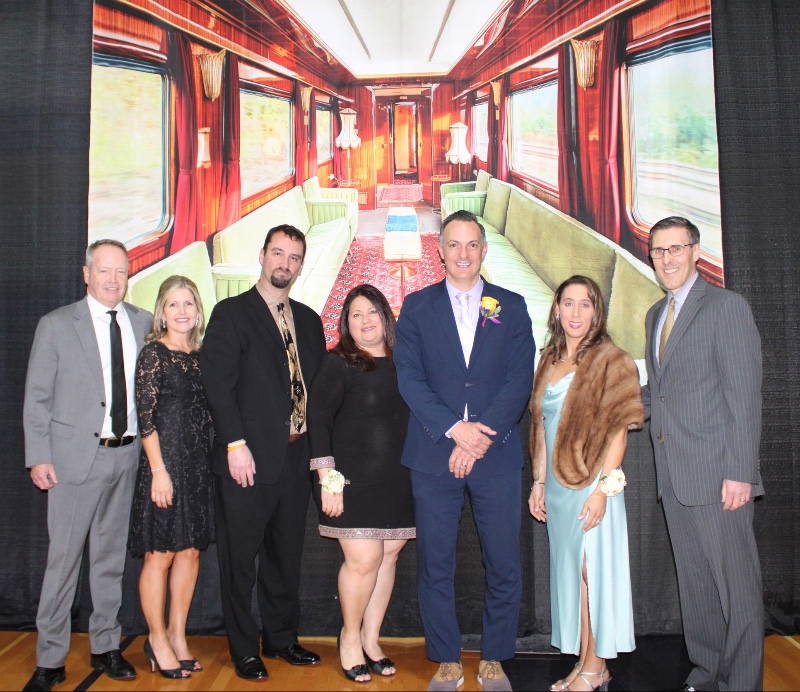 35th annual lasallian dinner and auction near syracuse ny image of President Matt Keough with auction co-chairs Scott and Kelly Wichman, Jeff '96 and Maria '96 Ascenzo, and Jenna and David MacLachlan