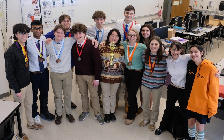 Science Olympiad Team Places Third At Meet; Earns State Championship Invite image of student winners in classroom