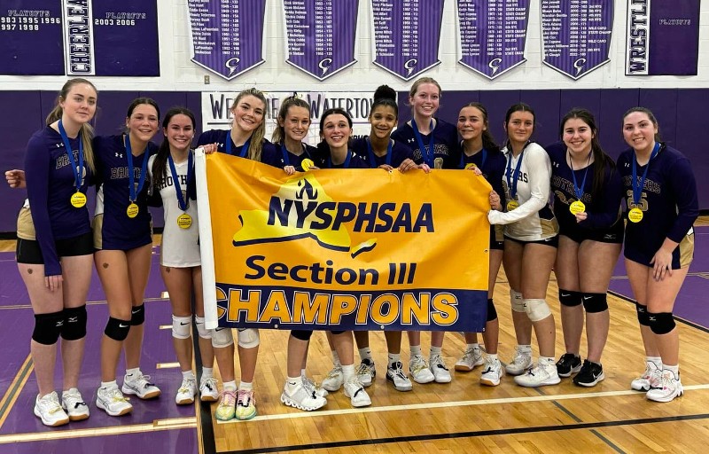 girls volleyball team crowned sectional champs image of the team holding the nysphsaa section iii champions
