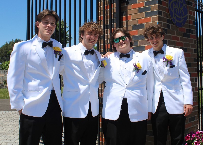 126 Students Graduate From Christian Brothers Academy near syracuse ny image of men smiling