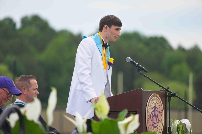 Maxwell Lachut speaking at cba graduation in syracuse ny in 2024