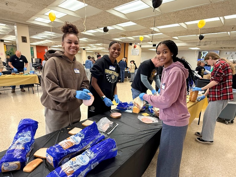 Students Making Blanket Service