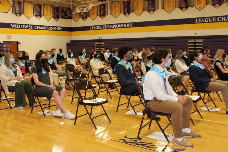 More Than 150 Students Inducted Into National Honor Society near syracuse ny image of students being inducted into national honor society