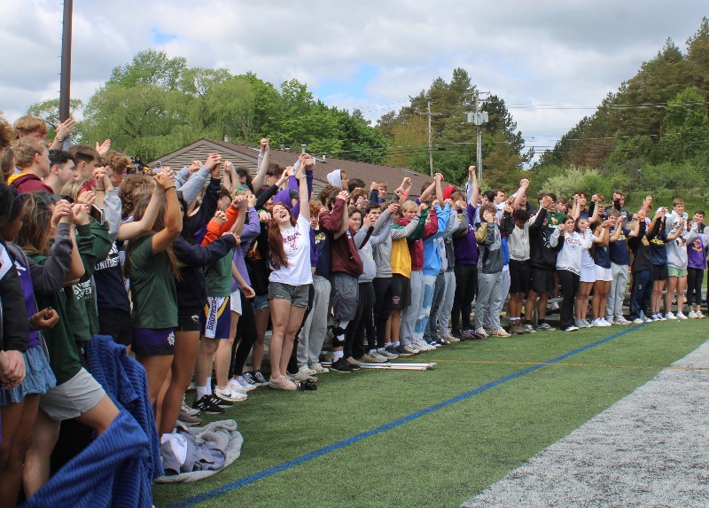 CBA Community Celebrates Founder's Day 2022 near syracuse ny image of students cheering outside