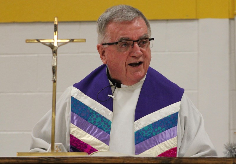 CBA Community Celebrates  Feast of The Immaculate Conception on Dec. 8 near syracuse ny image of priest