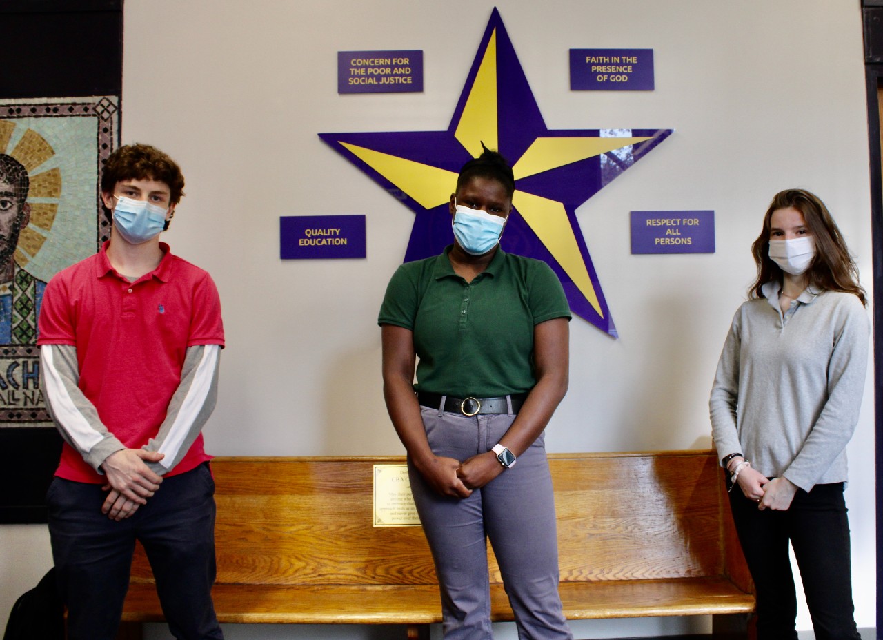 Davis Named Finalist In Syracuse Stage Young Playwrights Contest near syracuse ny image of three students standing with award