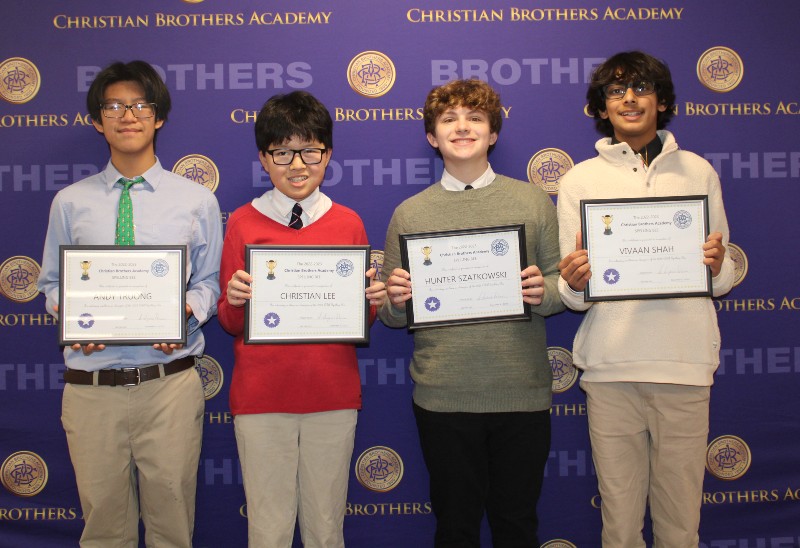 four students to represent cba in next round of spelling bee near syracuse ny image of students holding awards