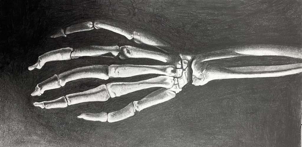 Students Win Scholastic Art Awards image of skeleton hand drawing