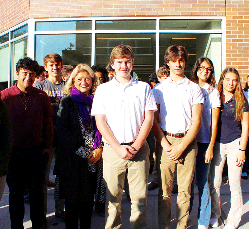 cba ribbon cutting ceremony group photo of students and holly