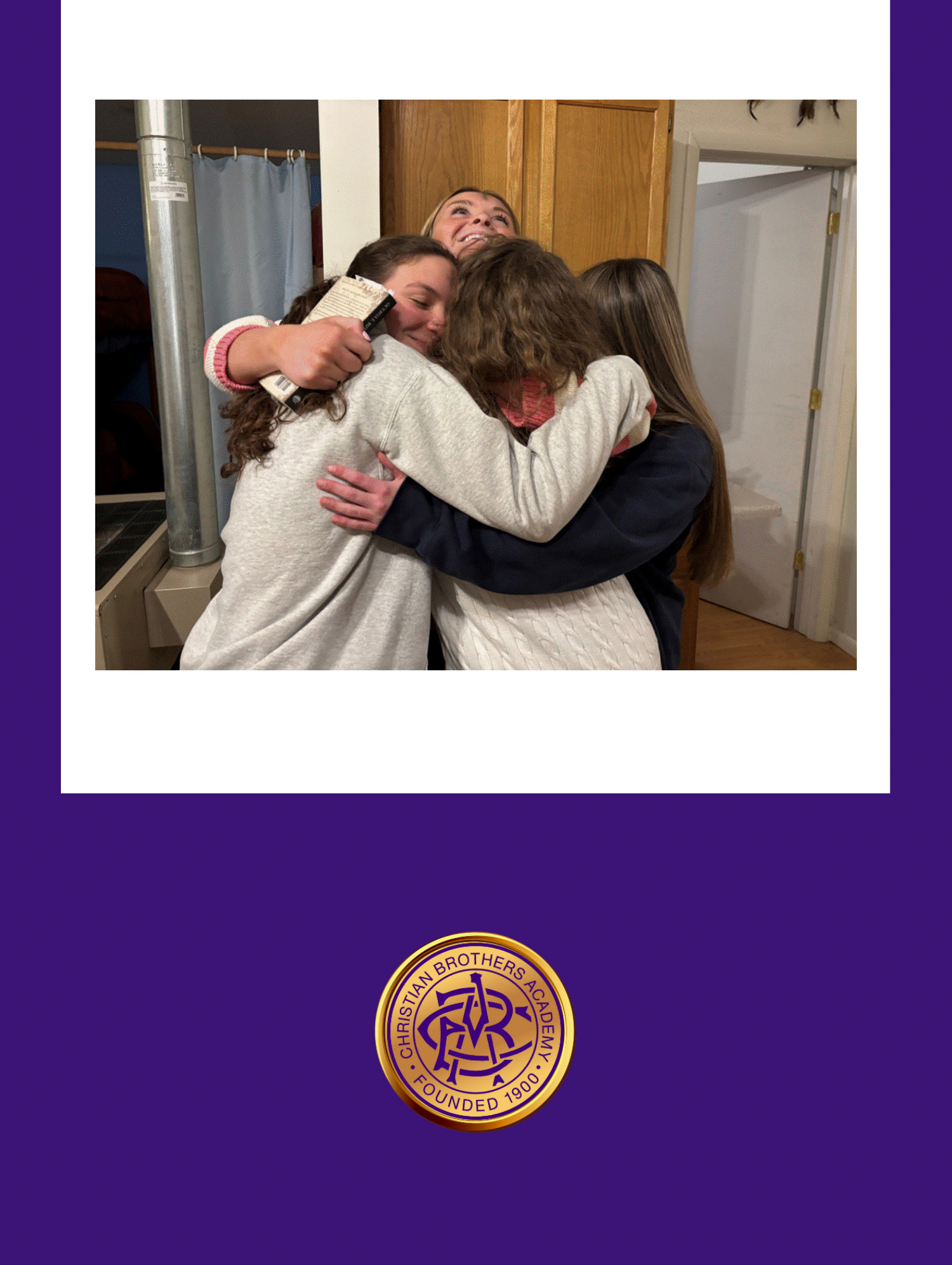 Christian Brothers Academy Students in Syracuse, NY embrace after trip to Blackfeet Reservation