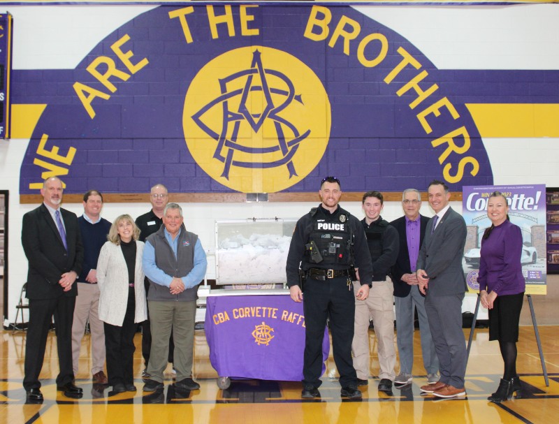 culeton winner of 33rd annual corvette raffle image of teachers with award