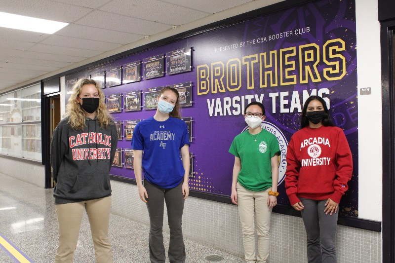 Class of 2021 College Destinations near syracuse ny image of four students with college acceptance shirts