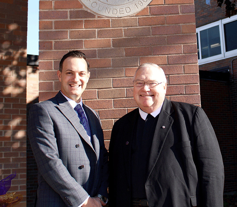 2020 Year In Review near syracuse ny image of president matt keough with priest