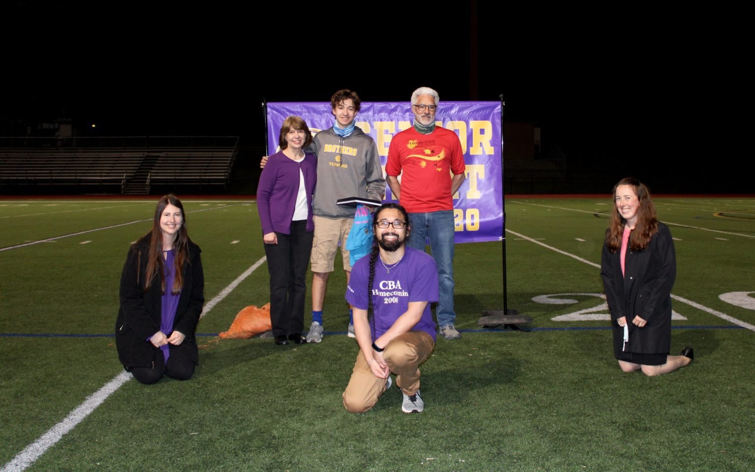 Michael Hill and his family with Jessica Tumajyan, Strings Director; Robert Michael Calimlim, Director of the Musical; and Erin Moore, Choral Director.