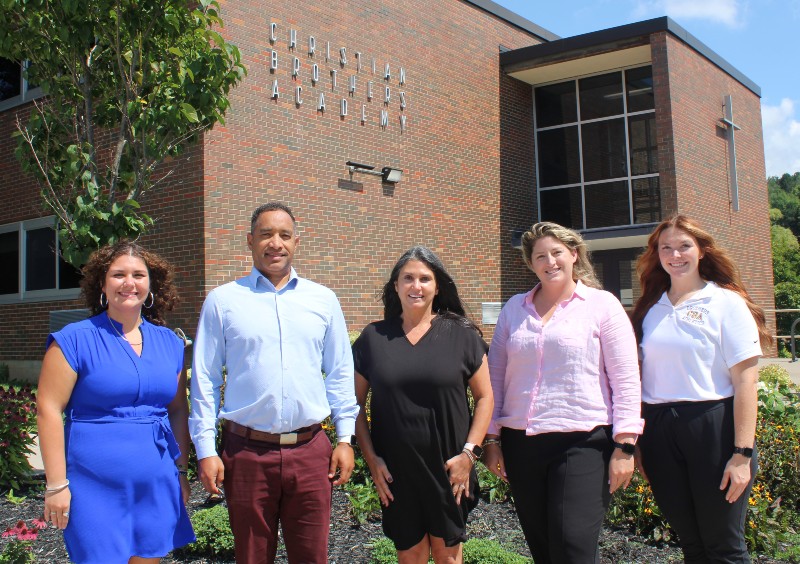 CBA Welcomes New Faculty & Staff Members near syracuse ny image of new staff and family