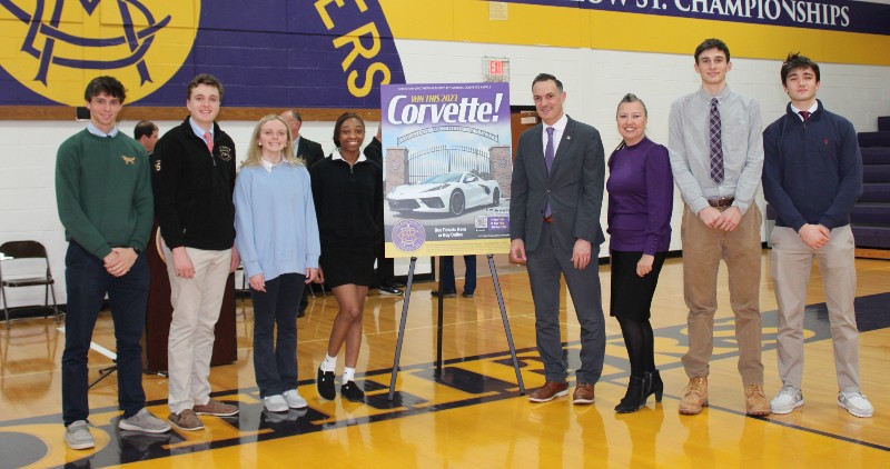 culeton winner of 33rd annual corvette raffle image of corvette award and students and teachers