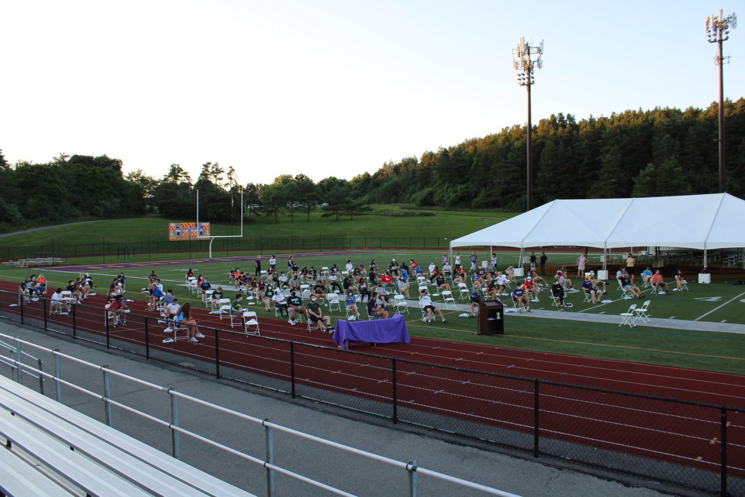 cba celebrates the class of 2020 socially distanced outdoor graduation ceremony with attendees wearing masks