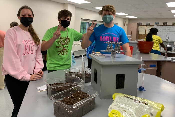 student clubs and activities near syracuse ny iamge of students planting