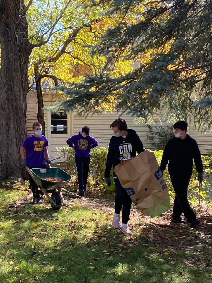 Brothers For Others near syracuse ny image of cba students clearning up outside