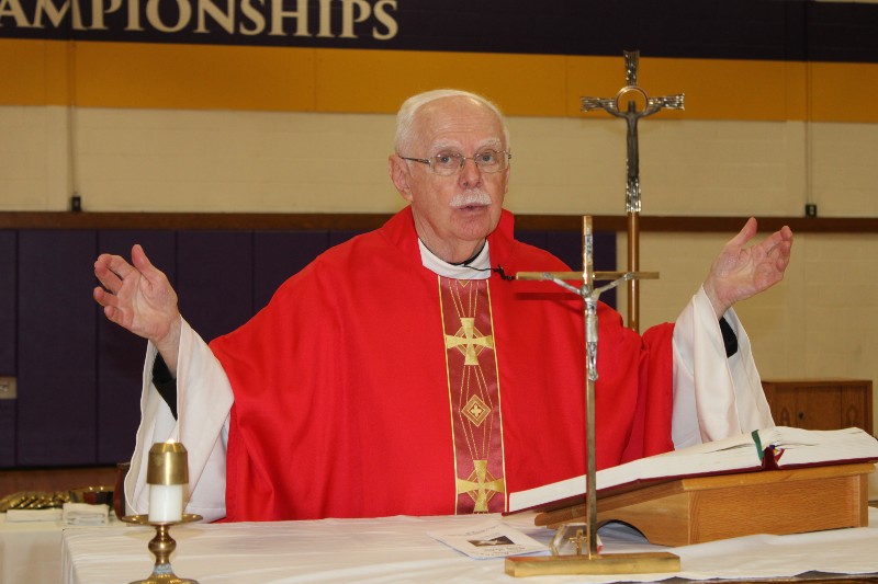 School Celebrates Mass of The Holy Spirit near syracuse ny image of priest