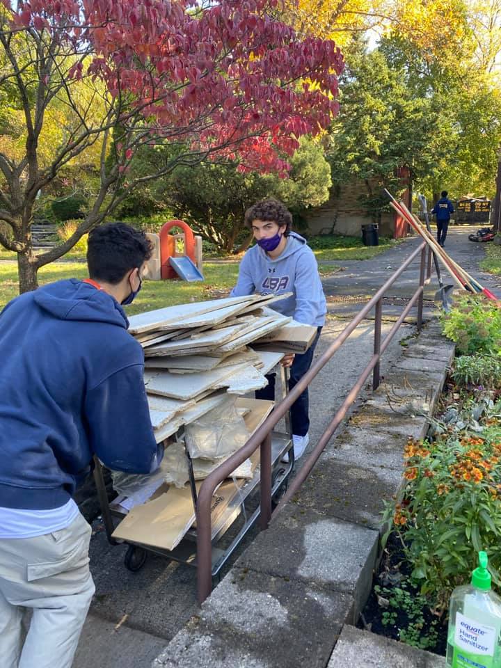 Brothers For Others near syracuse ny image of students working together