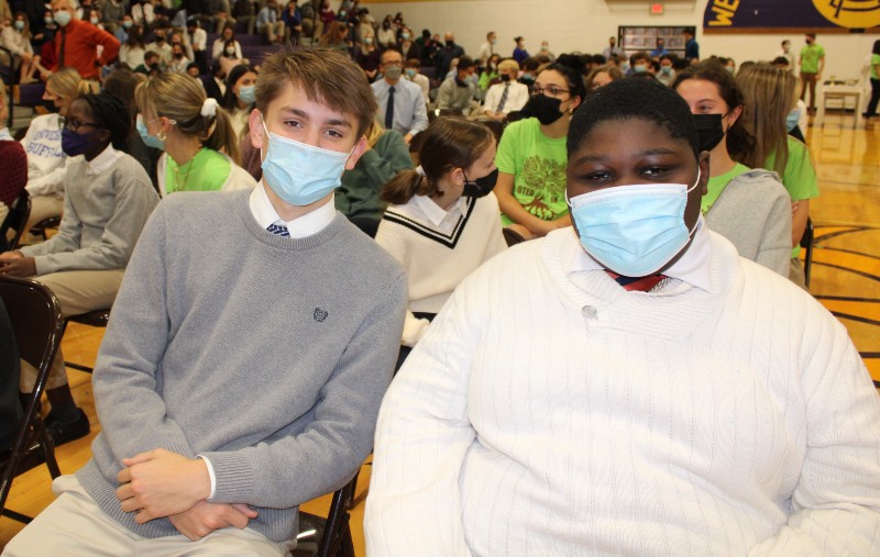 CBA Community Celebrates All Saints Mass On Nov. 1 near syracuse ny image of students sitting together