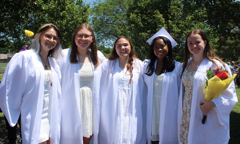 126 Students Graduate From Christian Brothers Academy near syracuse ny image of women smiling