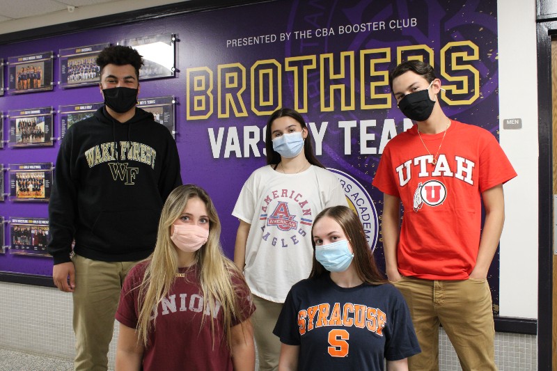 Class of 2021 College Destinations near syracuse ny image of students with college acceptance shirts