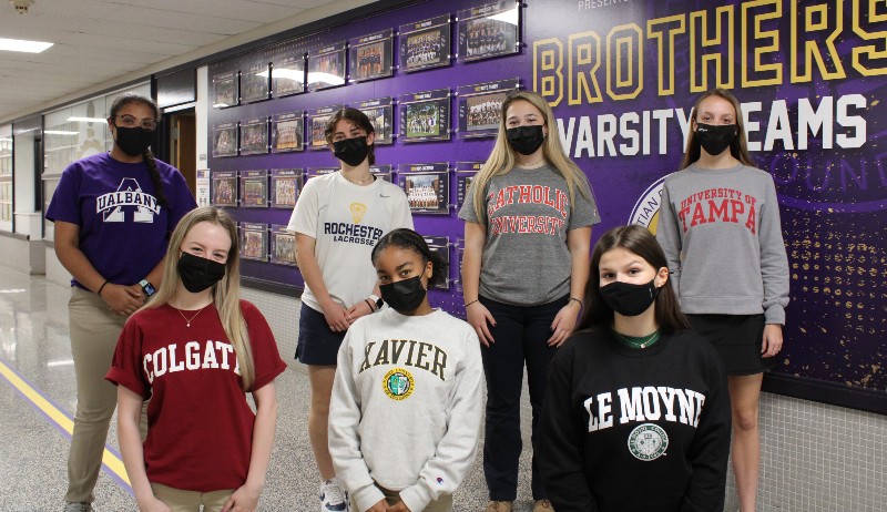 Class of 2021 College Destinations near syracuse ny image of students with college acceptance shirts on at cba