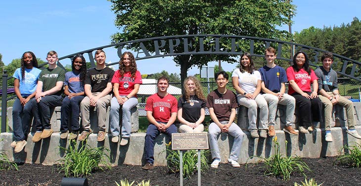 what colleges and universities visit CBA syracuse students wearing shirts of colleges they are attending