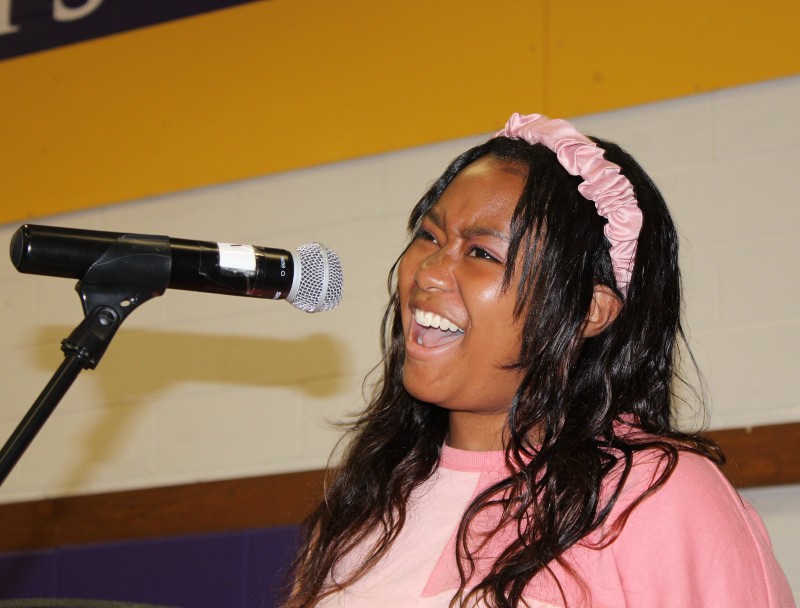 CBA Faculty And Staff Celebrate Mass of The Holy Spirit near syracuse ny image of student singing