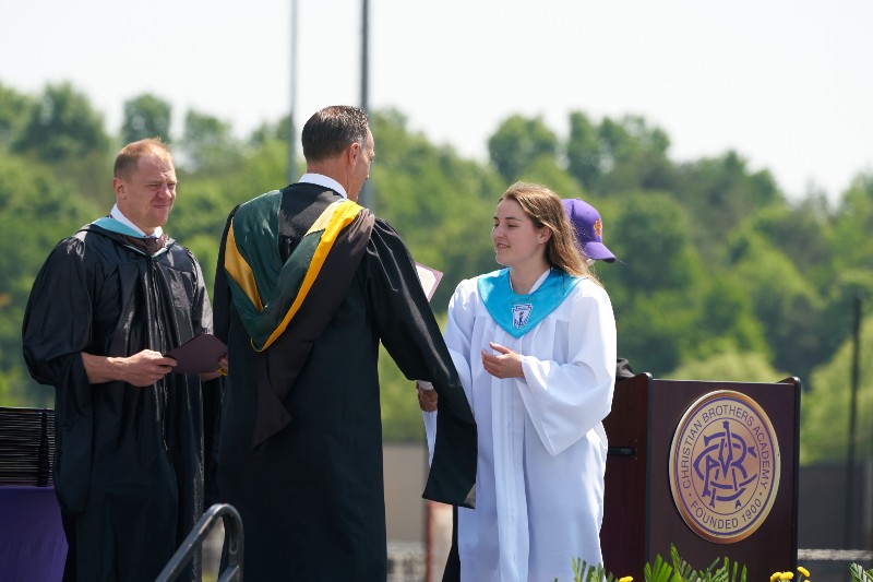 award ceremony june 2023 at cba image of student getting award