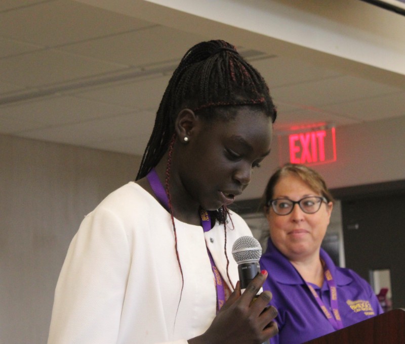 Bridge To CBA Brothers Participants Recognized At Reception image of student reading